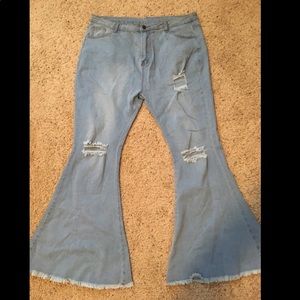 Light-wash distressed bell bottom flares